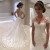 Import 2020 Short Sleeve Wedding Gown Bride Vestido De Noiva White Backless Lace Mermaid Wedding Dress from China