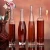 Import 375ml 500ml custom clear and frosted glass empty juicy bottles beverages wine bottles from China