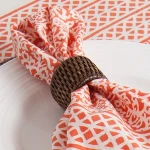 Brown round rattan napkin rings from Vietnam