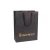 Import Handle Gold Hot Stamped Foiled Logo Black Packaging Shopping Paper Bag from China