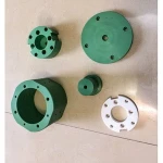machine Custom green oil filled Nylon and Macor glass-mica ceramic parts