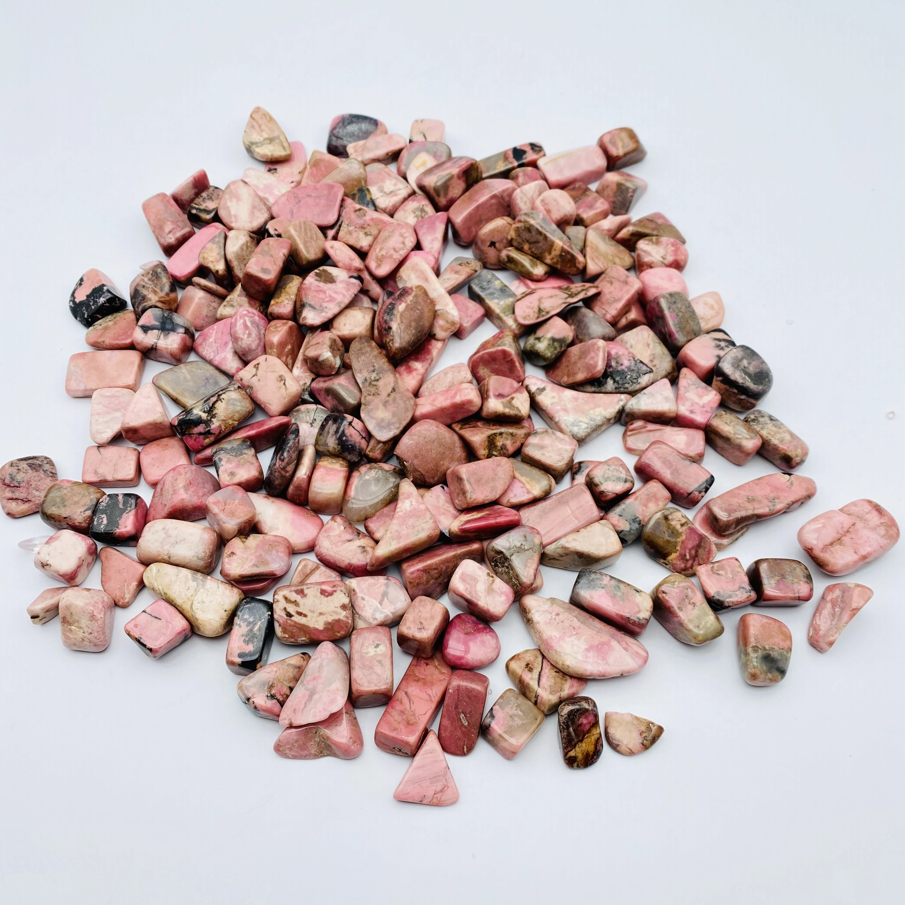 Natural pink rhodonite tumbled stone polished crystal gravel stone healing for sale