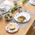 Import Nordic Hot Selling Good Quality Decal Printing Ceramic Plate Round Dinner Set from China