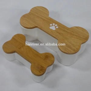 Pet application ceramic cremation bone shape pet urns with hand paint paw mark for pets ashes with wooden bamboo cover