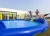 Import Top quality inflatable swimming pool with slides 0.9mm PVC pirate ship inflatable water park with pool from China