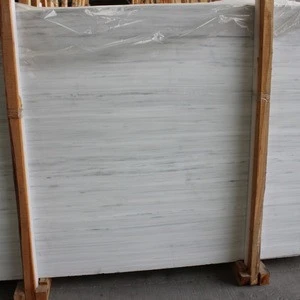 White marble effect wall tiles cut-to-size chimenea