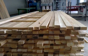 White wooden board of linden edged, bulk, humidity 7-9 %, raw timber wood