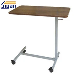 wooden tops used for bedside hospital food table