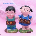 2019 Best selling home decoration yiwu export Little doll couple resin crafts for kids promotional birthday small love gift