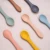 Import 2021 BPA Free Eco Friendly Food Grade Training Feeding Silicone Baby Spoon from China