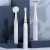 Import 6 Modes Smart Timer and IPX7 Waterproof Electric Toothbrush with 5 Dupont Brush Heads and Face Massaging Washing Brush Head from China