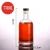 Import Customized round super flint 375ml 500ml 750ml whisky rum gin tequila vodka brandy glass bottle from China
