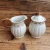 Import European style antique  ceramic embossed milk jug sugar pot with lid stoneware milk &amp; sugar jug sets from China