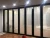 Import hot sale double frosted glass sliding folding partition door office glass partition wall from China