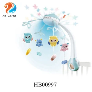 Hot sale remote control Projection cute  baby bed bell rotating crib musical and light mobile with hanging toys