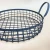 Import Hot selling kitchen living room home metal iron wire round vegetable fruit storage bowl basket from China