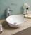 Import Modern Wholesale Above Counter Bathroom Washbasin Round Ceramic Art Basin from China