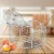 Import Pretty Chicken Shape Chrome Plated Metal Wire Fruit Hanging Basket Egg Holder wire Fruit Basket Modern Wire Basket from China