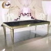 Stainless steel metal base black glass top gold dining table