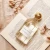 Import 100ml Round Empty  Luxury Gold Cap Parfum Packaging Bottle Spray Atomizer Glass Perfume Bottle from China