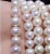 Import 9-10mm loose strong gloss slightly flawed circled round white pearl in 39cm strand from China