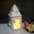 Import Christmas decorative red metal hanging candle holder house shape hurricane lantern with tree and moon from China