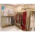 Import Gold metal clothing rack clothing shelf for clothing store display rack wholesale from China