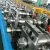 Import Good Quality Aluminium Galvanized Cable Tray Channel and Cap Double Row 2 in 1 Cold Roll Forming Making Machine Manufacture from China