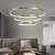 Import Guzhen manufacturers can customize contemporary acrylic gold ring chandelier stainless steel round led chandelier from China