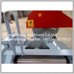 Hand push sliding table saw machine for round wood cutting work