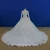 Import High quality beaded lace appliqued high collar muslin ballgown wedding dress from China