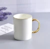 High quality simple white bone china drinkware 15oz porcelain ceramic mug with gold handle with custom logo