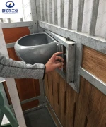 horse stable installed stainless steel swivel hay feeder