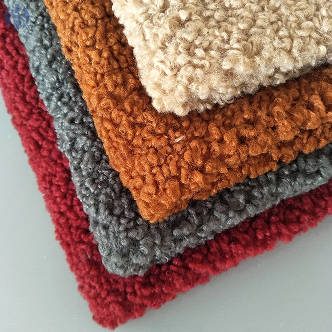 Hot sale 100% polyester wholesale knitted curly pile fleece fur fabric for garment