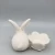 Import Premium rabbit decor flower plate shape white porcelain egg holder from China