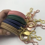 Fashion round keychain Rotating mini mirror Leather makeup mirror Portable makeup mirror Advertising Gift makeup mirror