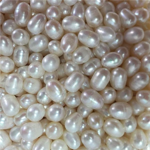 Chinese 7-8mm white rice drop shape no hole wholesale Kilogram cultured freshwater loose pearl