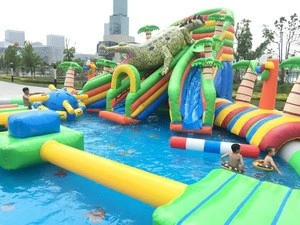 customized giant water park slides for sale cheap inflatable water park with floating obstacles