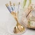 Import Electroplating Gold Fork Ceramic Handle Stirring Stainless Steel Tea Tableware Coffee Spoon from China