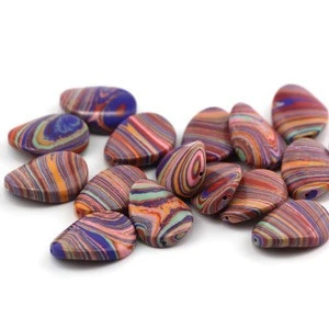 Natural stone bead with twisted oval shape