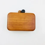 New fashion personality catwalk black and white buckle solid wood bag hand-held Messenger bag evening bag