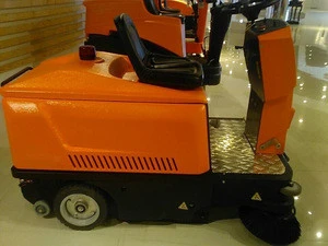 orange colour ride-on snow sweeper