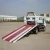 Import Shanghai heavy duty new condition flat bed road wrecker tow truck with Crane for sale from China