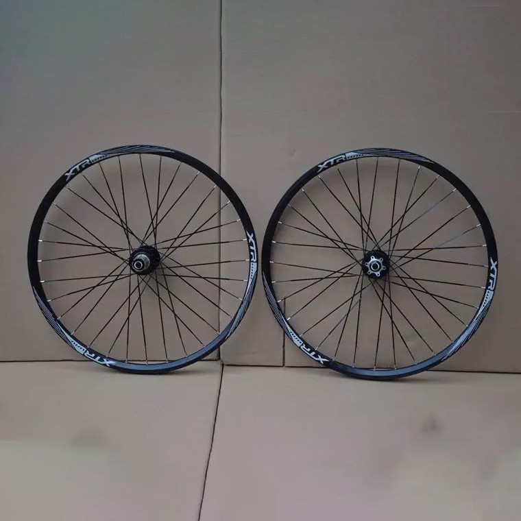 The latest hot selling 26 inch 27.5 inch 29 inch spoked wheel  road bicycle mountain bike wheel