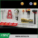 TJG fashion display ring hooks are used in conjunction with perforated plates and frame sets.