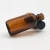 Import 16oz pharmaceutical bottle amber glass boston 15ml 30ml 60ml 120ml  500ml round bottle with black cap from China
