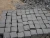 Import Cheap China Tumbled Cherry Black Basalt Stone driveway pavers mesh para patio mat from China