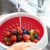Import flexible silicone foldable kitchen sink colander basket fruit strainer from China