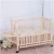 Import Hot Sale Baby Hanging Bed Cot Baby Crib With Swing from China