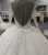 Import Latest design crystal bead trailing bridal gown ivory lace simple wedding dress with long sleeve from China